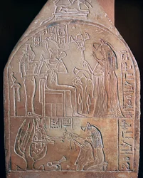Egyptian detail of the funerary stele of a singer in the temple of Amon