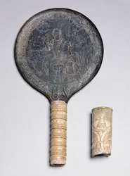 Etruscan Ivory Handled Mirror with Engraved Decoration depicting Odysseus Threatening Circe; Ivory Gorgoneion Handle, 4th century BC