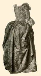 Gown of Yellow Damask Brocade Worn Over a Blue Quilted Satin Petticoat