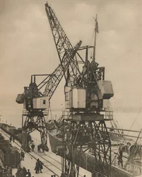 Huge Mobile Cranes at Tilbury Swing the Cargo from a Vessel