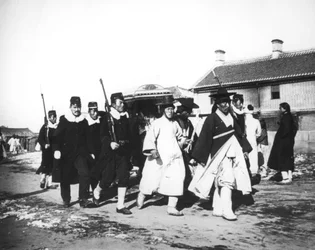 Japanese Official with an Escort of Soldiers, Korea