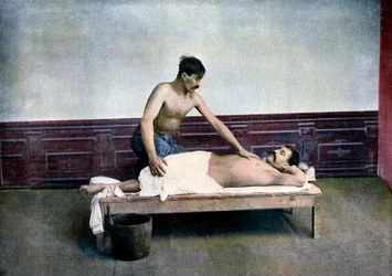 Man having a massage in bath house