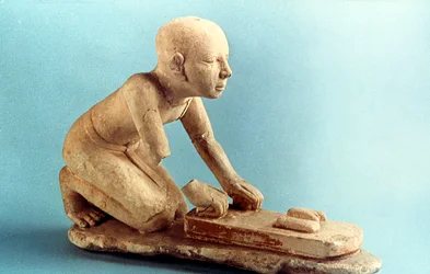 Model of a baker kneading dough and forming loaves, Ancient Egyptian