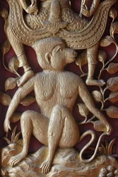 Monkey relief on a door in Wat Dab Phai, Chiang Mai Thailand