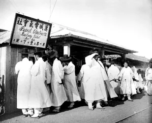 Queuing for railway tickets, Seoul, Korea, 1900