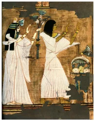 Rames and his wife in adoration before a table heaped with offerings