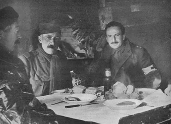Red Cross Officers at Dinner in a Dug-out