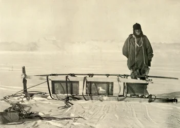 Shackleton standing by the Broken Southern Sledge