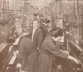 The busy interior of a flourishing silk factory in Japan