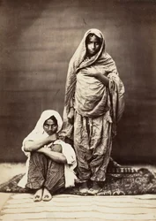Two Indian Women, One Seated