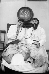 Two Drunken Men in a Bed