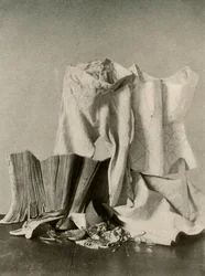Two pairs of stays, breeches, bead bag, purse and quilted petticoat, c18th century, 1937