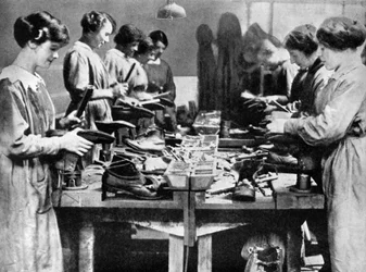 Women cobblers repairing footwear for the war effort