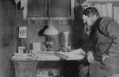 Otto Nordenskjöld at his desk, Snow Hill, Antarctica