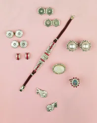 Selection of Art Deco jewellery; calibre cut ruby watch; button, cufflink and studs; earrings; Mabe pearl and diamond earrings