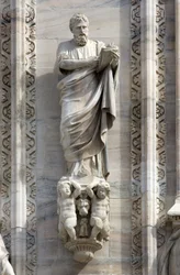 Architecture: statue of St. Mark by Donato Carabelli (1811). Detail of the facade of the Cathedral of Milan, Italy