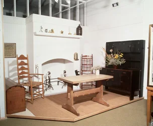 Arts and Crafts interior showing furniture and metalwork designed by Ernest Gimson and Ernest Barnsley
