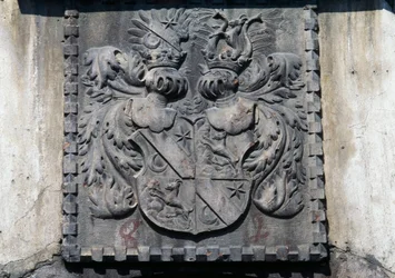 Coat of arms on wooden door of home in Lavis, Trento, Trentino-Alto Adige, Italy