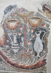 Detail from a mosaic floor depicting cups, wine jugs and decanters from the Samaritan synagogue at El-Khirbe, West Bank, 4th century AD