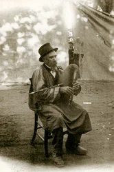 Folklore of Auvergne: musician playing Chabrette, early twentieth century
