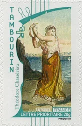 French postage stamp showing a gypsy woman playing the tambourine