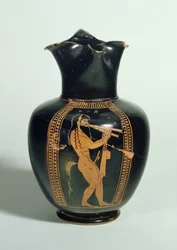 Oinochoe, decorated with Satyr playing double flutes, Attic red figure, Athens, Greek, 520 BC
