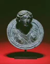 Gallo-Roman repousse applique roundel with the bust of a female, 2nd-3rd century AD