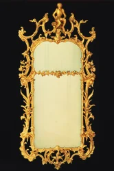 George III Giltwood Pier Mirror, with Two Plates, Elaborate Cresting, Centred by the Figure of a Monkey on a Rockwork Stand, c.1765
