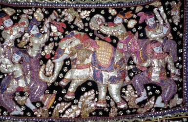 Handcrafted embroidered cloth depicting knights, ladies and elephants