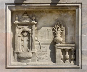 High relief representing a well covered by Francesco Bono (1654). Cathedral of Milan, Italy