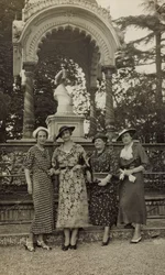 Ladies posing under the monument to Indian in the Parco delle Cascine of Florence