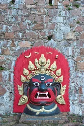 Large brightly painted Tibetan mask of bronze; Demon; Messner Mountain Museum Firmian from Reinhold Messner; Schloss Sigmundskron Castle; near Bolzano; Alto Adige; Trentino-Alto Adige; Italy; Europe