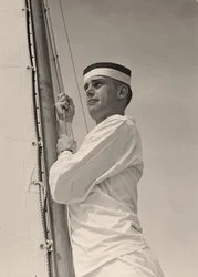 Midshipman hoisting the main Sail, U.S. Naval Academy, Annapolis, Maryland. 1942