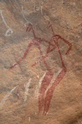 Rock Art, Prehistory: Rock painting of two longiline characters in an ornate shelter in the Uweinat Mountains, Sudan