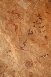 Rock Art, Prehistory: Rock Painting of Characters and Cattle in an Ornate Shelter, Uweinat Massif, Egypt (8000 to 3000 BC)
