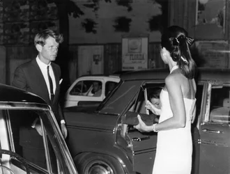 Senator Robert Kennedy with his wife. Via Veneto. Rome. 1966