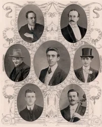 Seven of the eight members of the ship