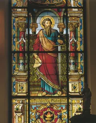 Stained glass window of a saint