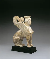 Terracotta figure of a sphinx, from South Italy, Greek, late 5th-early 4th century BC