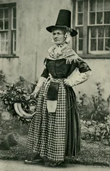 Wales. A stately old Welsh dame, staunch to national costume. 1920