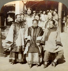 A group of women in the courtyard of a wealthy Chinese house, Peking, China, 1902