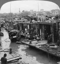 A street of flower boats, Canton, China, 1900