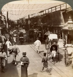 Midsummer Traffic Under the Awnings of Shijo Bashidori, a Busy Thoroughfare of Kyoto, Japan
