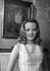 Catherine Hiegel in front of the canvas by Renoir at home, French, from the Comédie-Française, after signing her contract for the role of maid on 30 January 1969