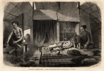 An Annamite interior in Lakon (Laos). Engraving illustrating a voyage of exploration in Indochina by Francis Garnier, published in 