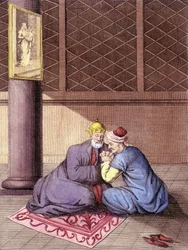 Armenian bishop listening to the confessions of a man