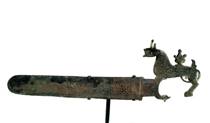 Bronze Saw with the Blade Decorated with Inscriptions