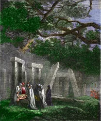 Druids practicing a human sacrifice at Stonehenge stopped by Roman soldiers - Colouring engraving of the 19th century