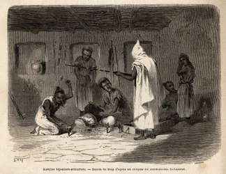 Kabyl artisans reputed for their skill in making jewelry and weapons (and formerly in counterfeit currency) in the Djura region (Algeria). Engraving to illustrate the excursion to the great Kabilie, between the Mediterranee and the Djurjura, in 1864, by th