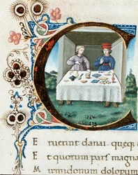 Decorated initial C with a couple at the table. Miniature from "The Bucolics" (Eclogues) by Virgil (Publius Vergilius Maro) (70-19 BC) (ms. IV E.12) - 15th century, Naples, Biblioteca Nazionale